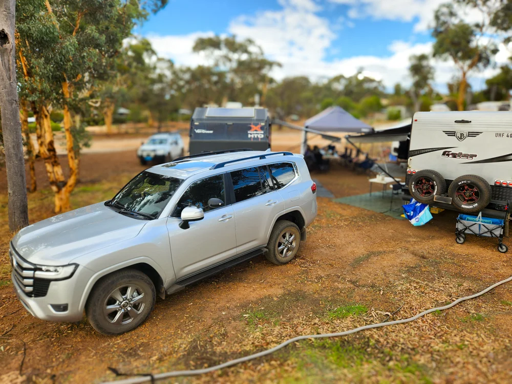 Photo of a LandCruiser 300 Series at a bush camp site